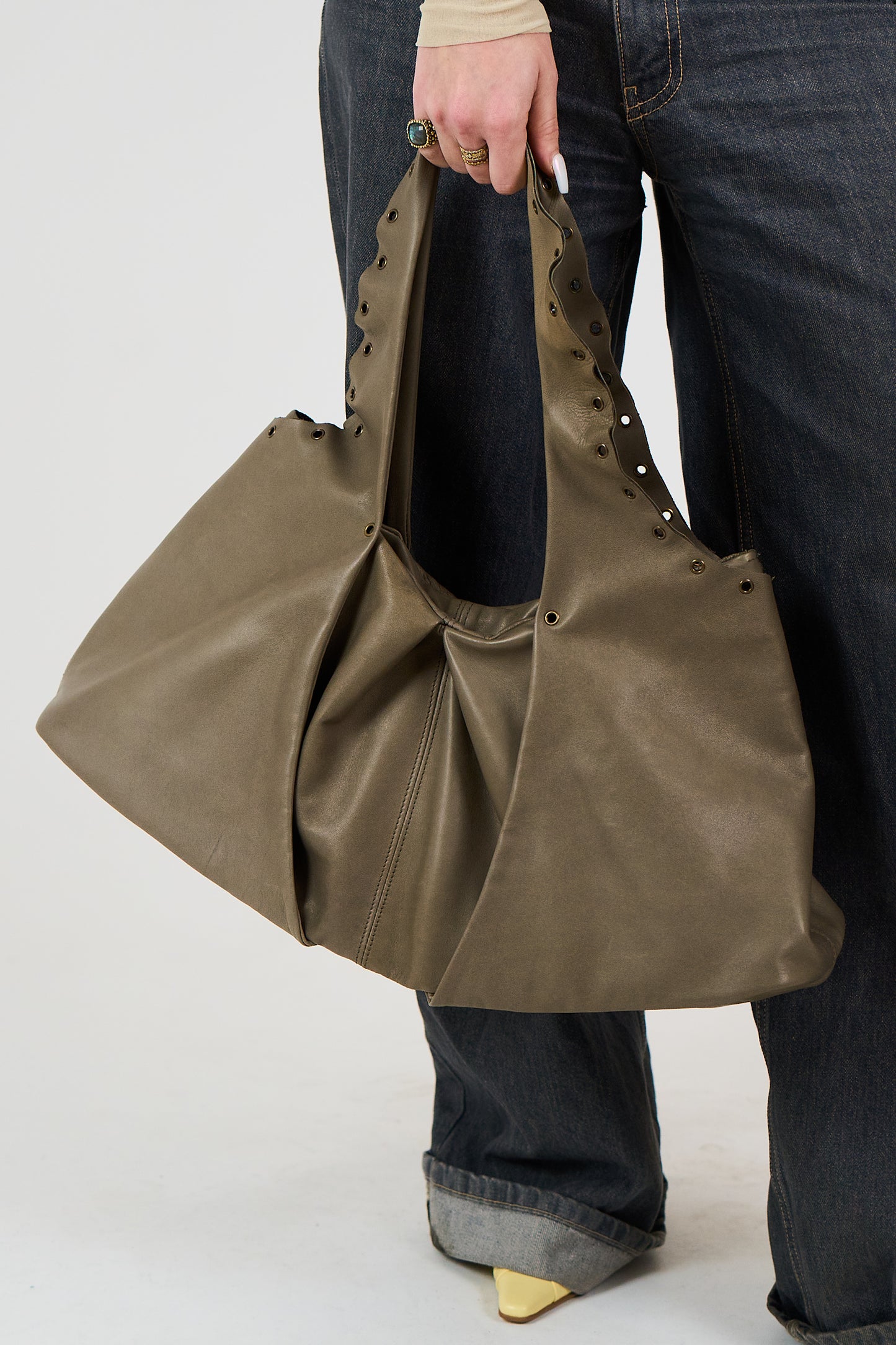 KAKHI MIDI EYELETS DUMPLING BAG
