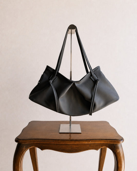 DUMPLING BAG IN DUST